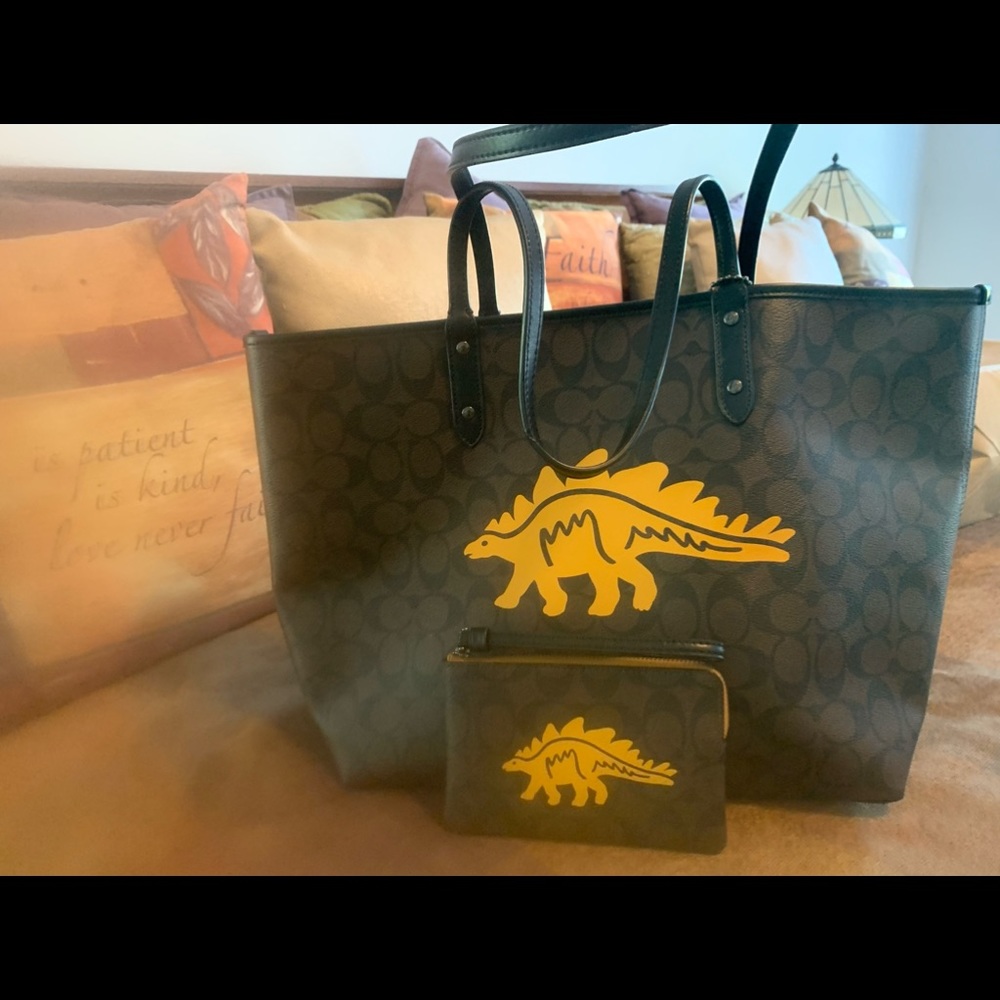 Coach stegosaurus bag and wallet.